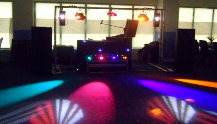 Rig with lights playing on the dance floor